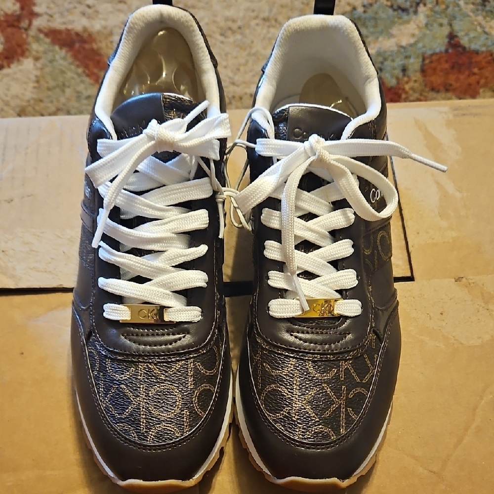 Calvin Klein Black and Gold Sneakers